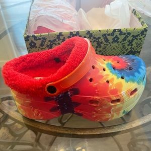 Gorgeous unique platform crocs in vibrant colors and sherpa insert.